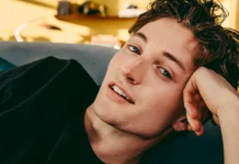 The Gen Z Pop Sensation You Need on Your Radar A vibrant image of Henry Moodie performing on stage, captured mid-performance with an engaging expression, perfectly representing his Gen Z appeal and musical energy.