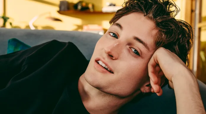 The Gen Z Pop Sensation You Need on Your Radar A vibrant image of Henry Moodie performing on stage, captured mid-performance with an engaging expression, perfectly representing his Gen Z appeal and musical energy.